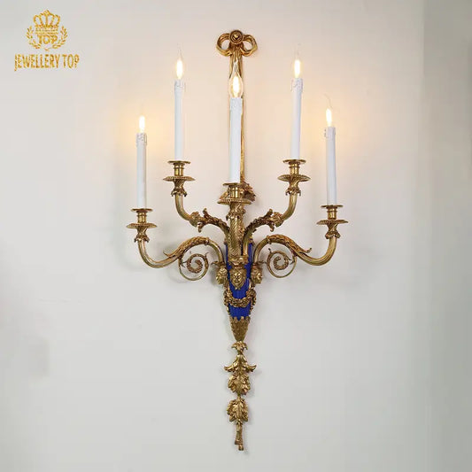 Versailles-style brass wall sconce with blue enamel detailing