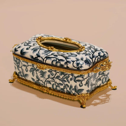 Decorative tissue box showcasing European-style botanical patterns and golden feet