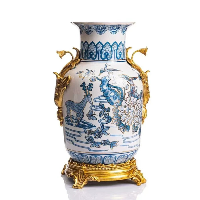 Front view of blue and white porcelain decorative vase with stag, crane, and floral motifs.
