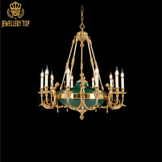 JEWELLERY TOP’s vintage brass chandelier featuring a central green ceramic orb and candle-style bulbs.