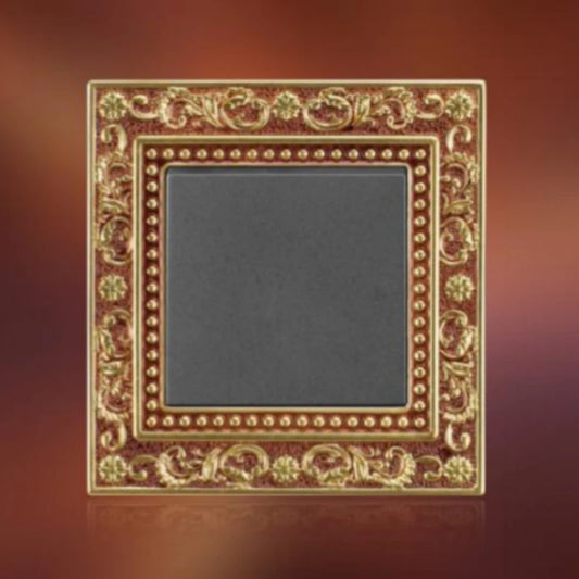 Brass wiring device with carved border and European-style socket outlet