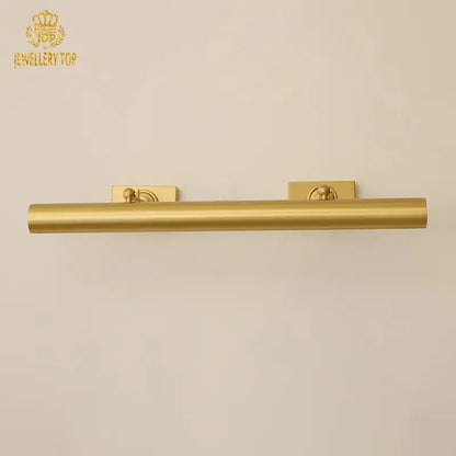 Classic brass picture wall lamp in warm lighting