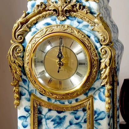 Full perspective of a European classical table clock showing its ceramic body, brass feet, and ornate crown.