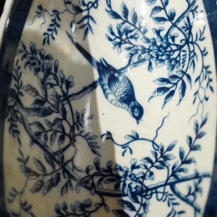 Ceramic tray used as a fruit platter with colorful fruits and blossoms