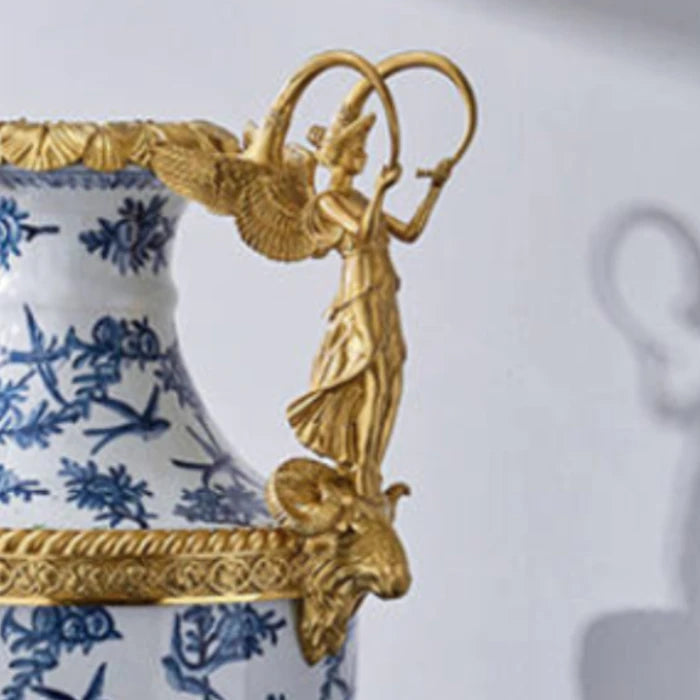 Front perspective of modern home decor vase showing full ceramic and brass artistry