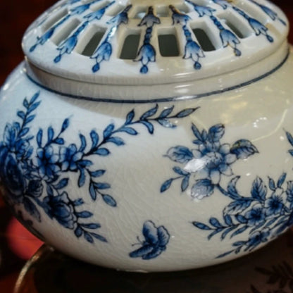 Top perspective of aroma stove showcasing design and dragonfly decoration