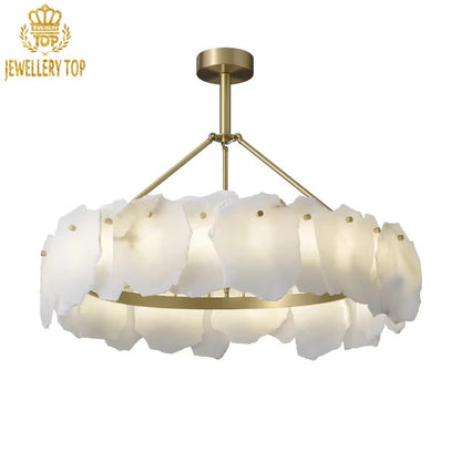 Marbella Bloom Alabaster Stone Chandelier radiating a soft, diffused glow