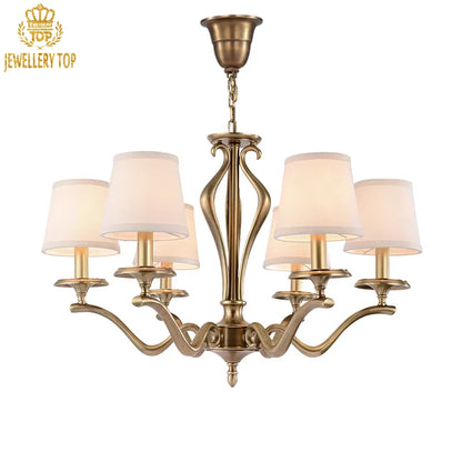 Rustic brass pendant light with white shades and scrollwork details