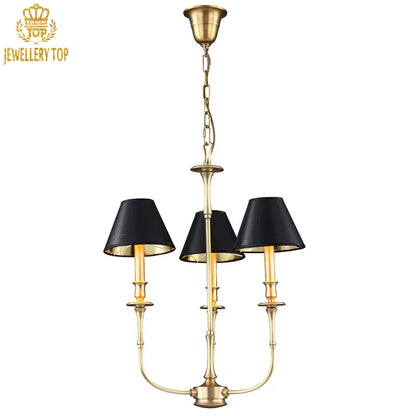 Dramatic black and gold lighting fixture for elegant dining spaces