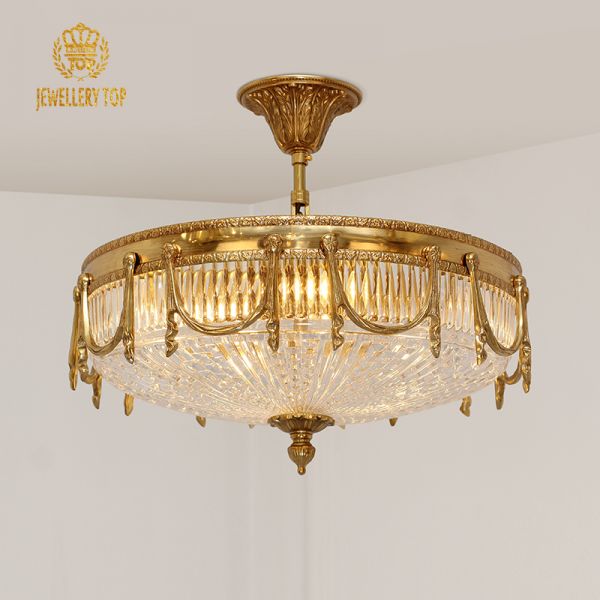Aurelia vintage flush mount ceiling light with brass garlands and crystal bowl.