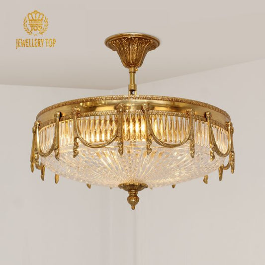 Aurelia vintage flush mount ceiling light with brass garlands and crystal bowl.