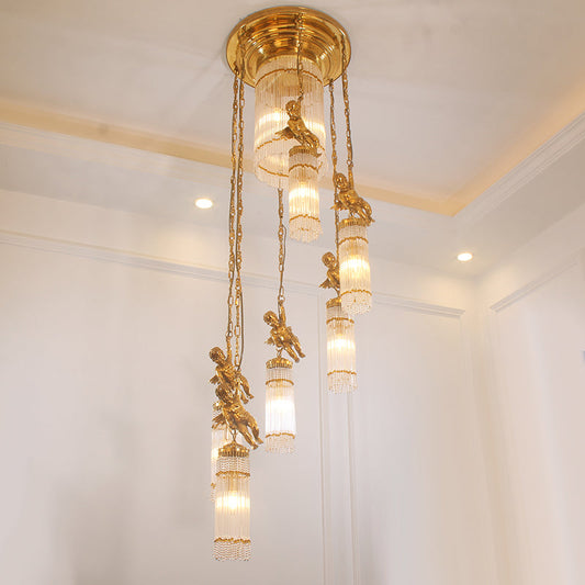 Close-up of vintage brass detailing on a staircase chandelier