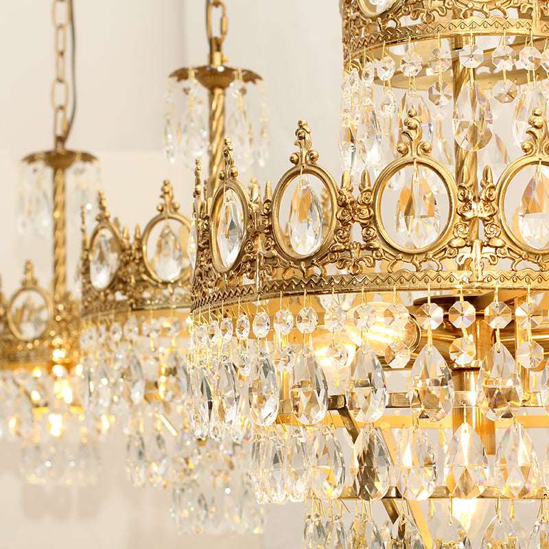 Detailed brass and crystal elements on the gold pendant lamp