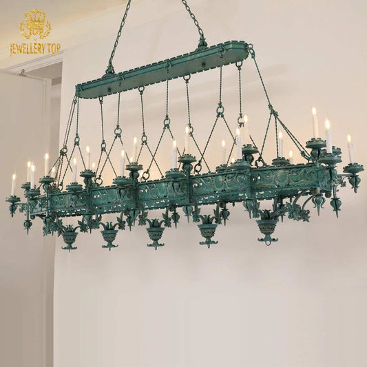 Vintage brass gothic chandelier with medieval details and patina finish.
