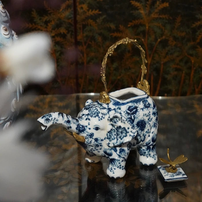 French design ornament showcasing elephant-shaped ceramic body and intricate brasswork