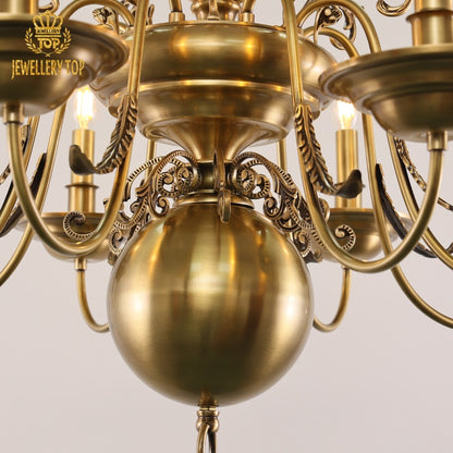 Celestial-inspired brass chandelier with fluted drip pans and warm glow