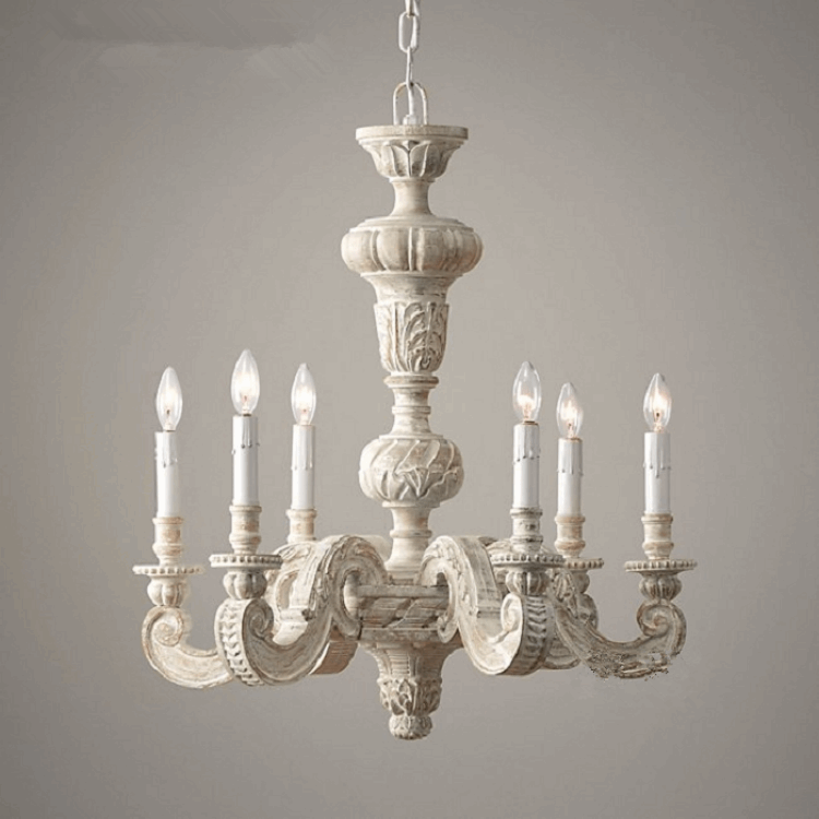 French vintage country chandelier with rococo floral arms in a farmhouse dining room