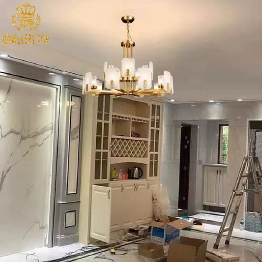 Asymmetrical alabaster chandelier with oxidized brass lattice in a high-ceilinged modernist lounge