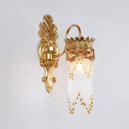 Side angle of the sconce, highlighting the curved brass arm and acanthus leaf motif