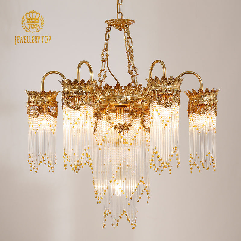 Exquisite brass detailing on vintage style chandelier arms