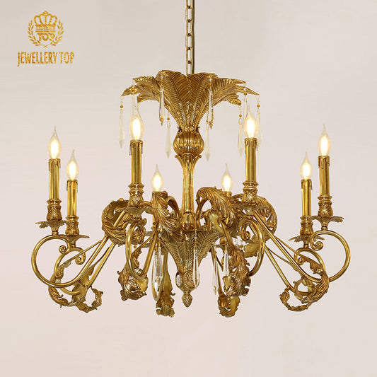 Elegant brass chandelier with intricate palm leaf details and vintage-inspired lamps.