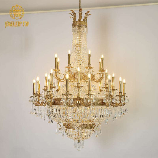 Empire chandelier crown top with brass foliage and candle bulbs detail