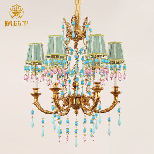 Farmhouse chandelier in brass with turquoise fabric shades