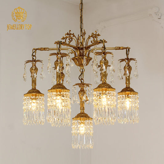 Vintage style chandelier with brass frame and crystal pendants