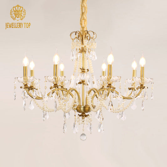 Ornate vintage French chandelier featuring pearl-inspired beads and crystal drops.