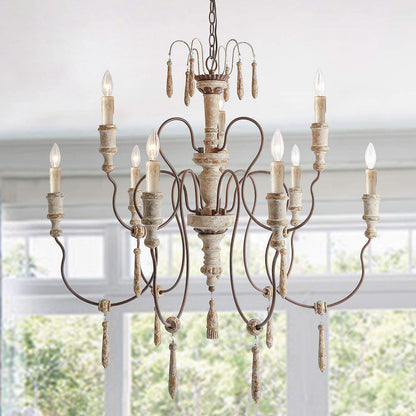 Rustic chandelier with grapevine-inspired arms and wooden pendants in a farmhouse dining room