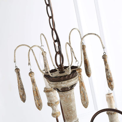Distressed oak and iron tassel details on vintage farmhouse ceiling fixture