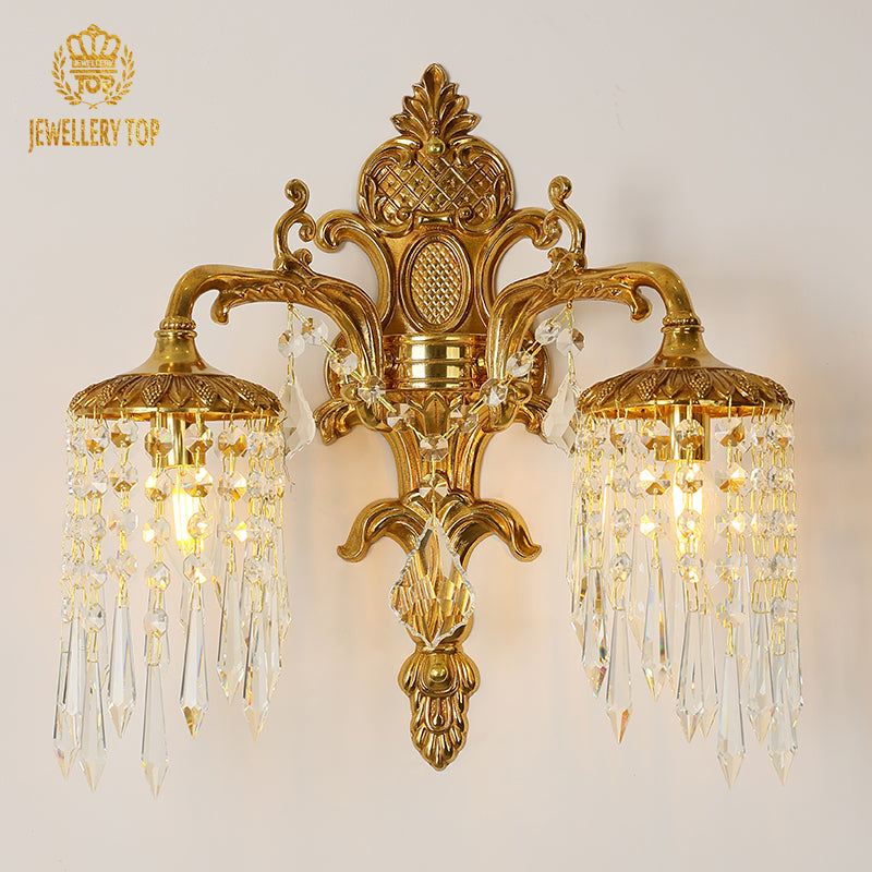 Front view of the Mirabella Cascade brass wall sconce with two crystal-laden