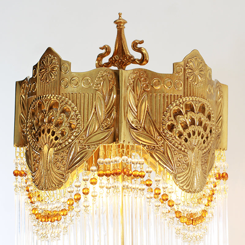 Close-up of brass peacock motifs on Queen Victoria Victorian Table Lamp