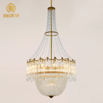 Rococo chandelier with brass frame and cascading glass crystals.