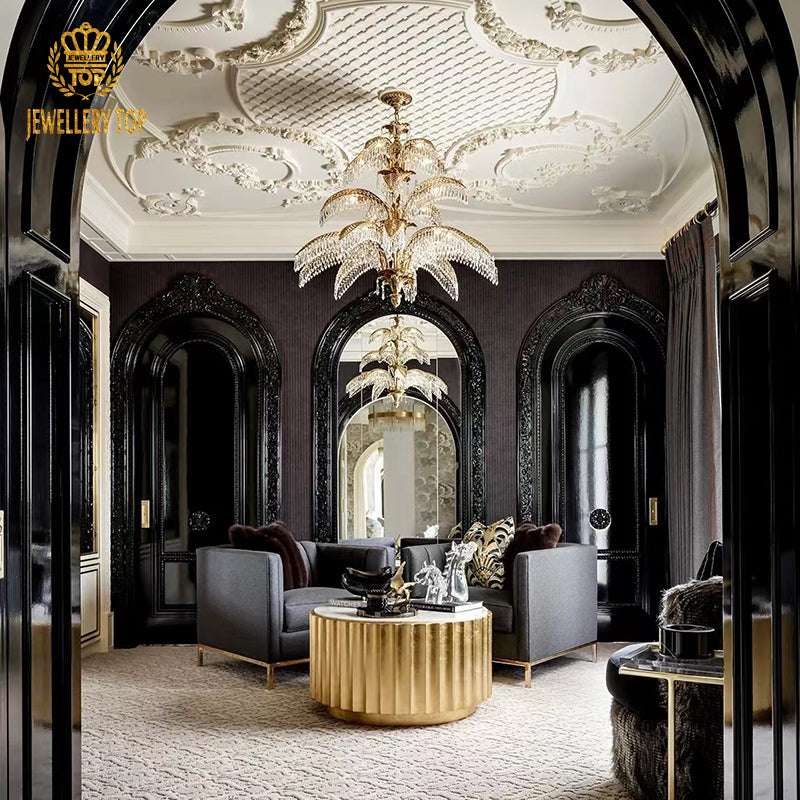 Exquisite crystal and brass palm chandelier reflecting soft light in a chic room.