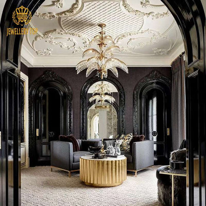 Exquisite crystal and brass palm chandelier reflecting soft light in a chic room.