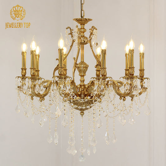 Vintage brass French chandelier featuring sparkling crystal pendants.
